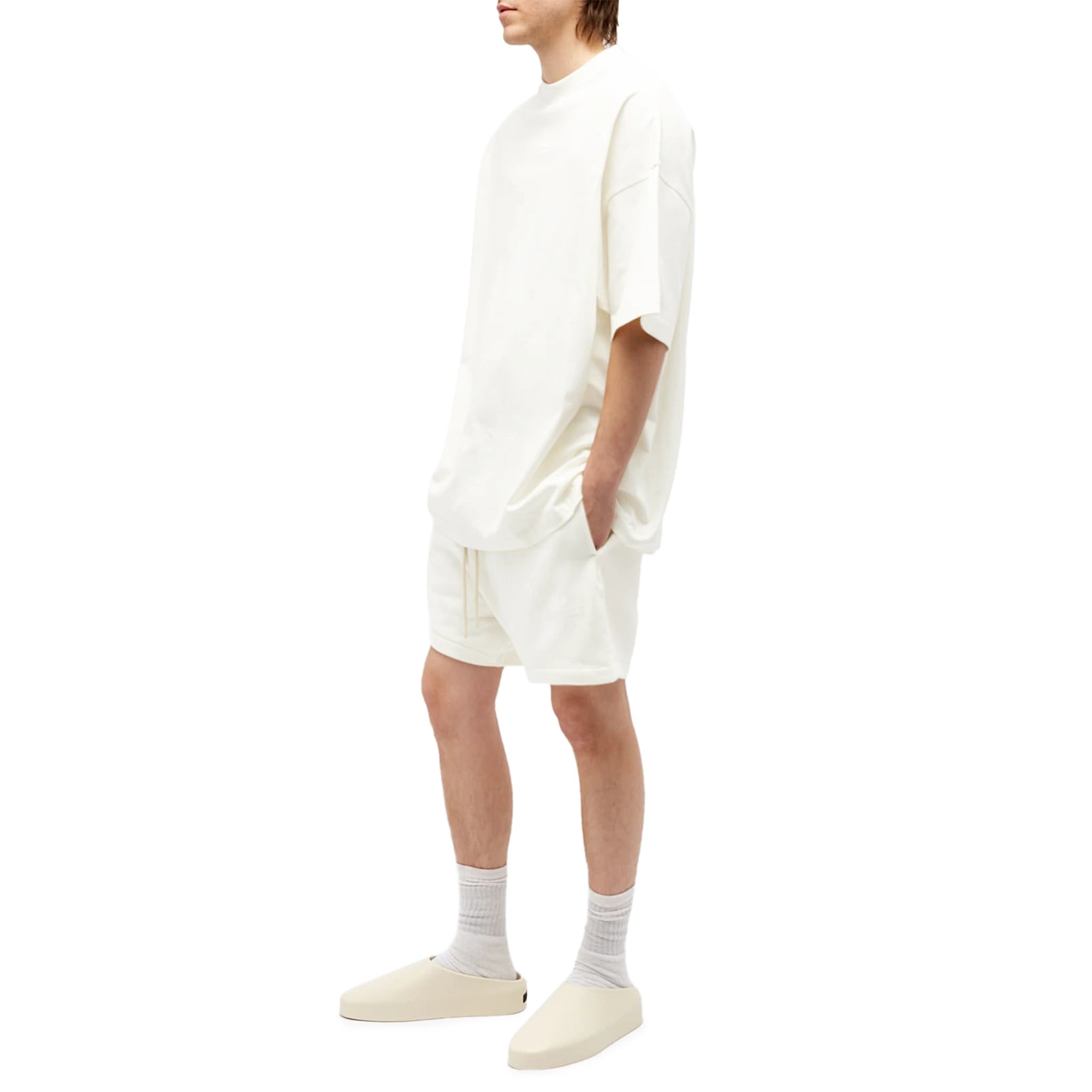 Model view of Fear Of God Essentials Cloud Dancer Shorts (FW23) 160BT232001F